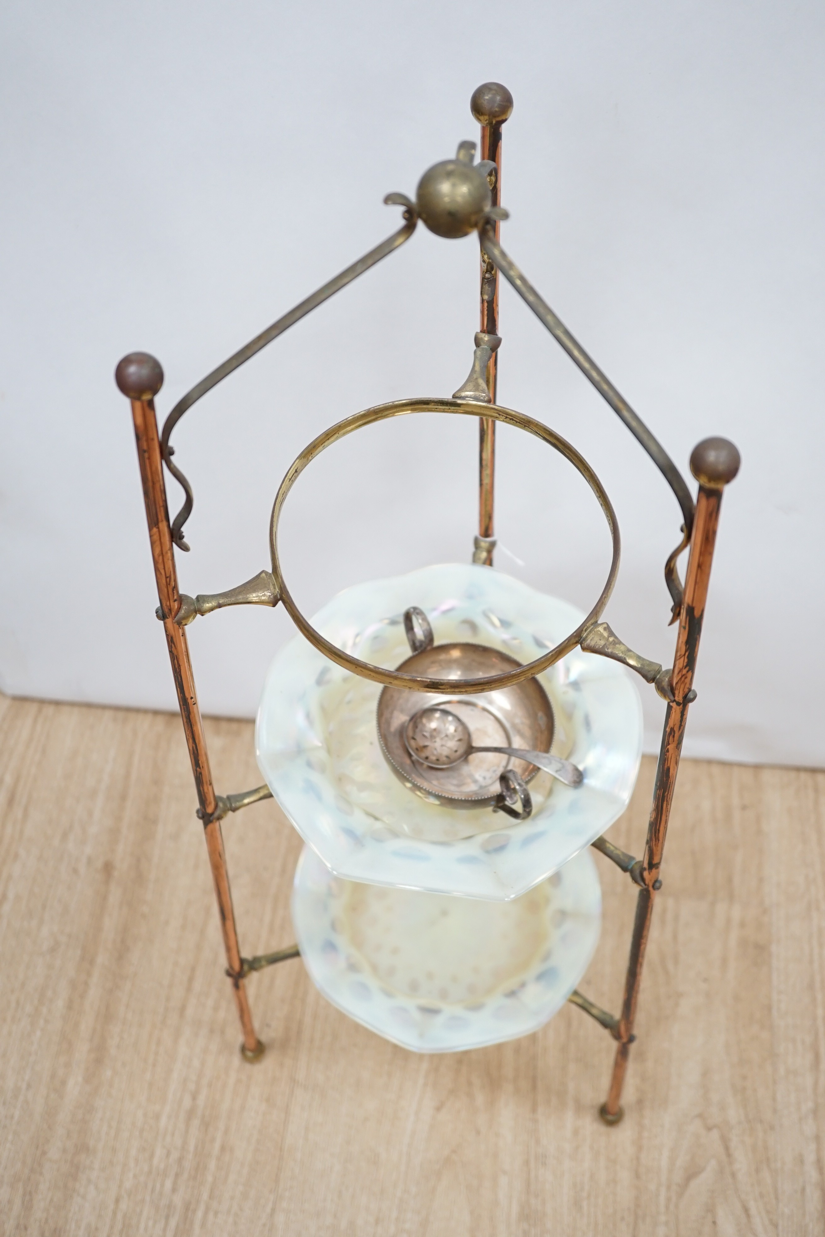 A W.A.S Benson brass and copper three tier stand, with two Vaseline glass dishes (upper dish lacking) 60 cms high.